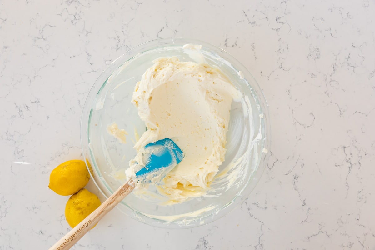 process shot in no bake lemon cheesecake.
