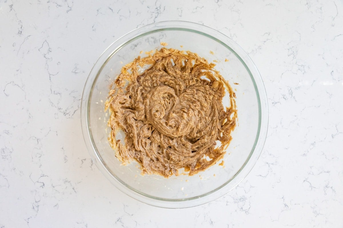 bowl of wet cookie dough before flour.