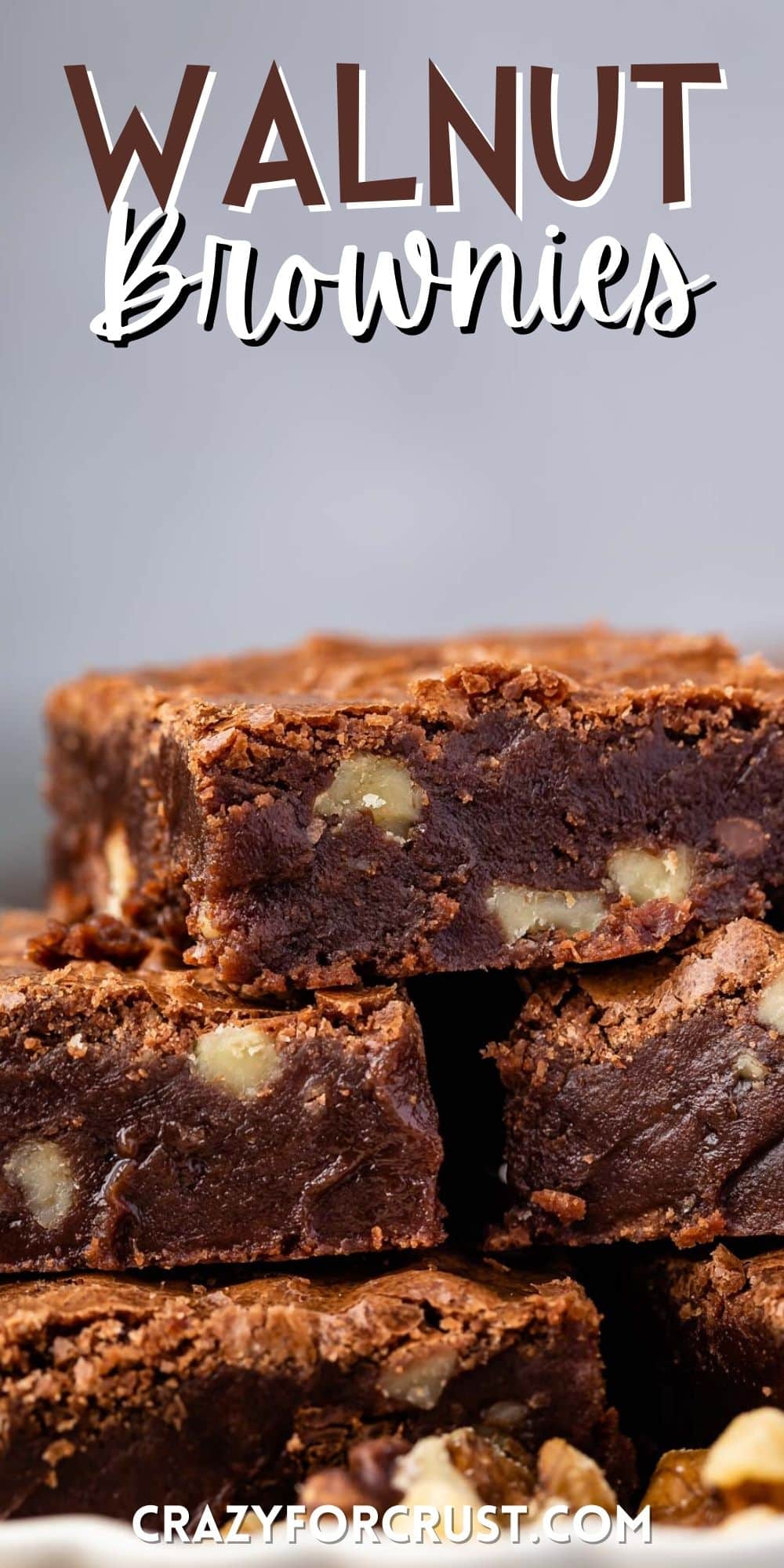 stacked brownies with walnuts baked in and words on the photo.