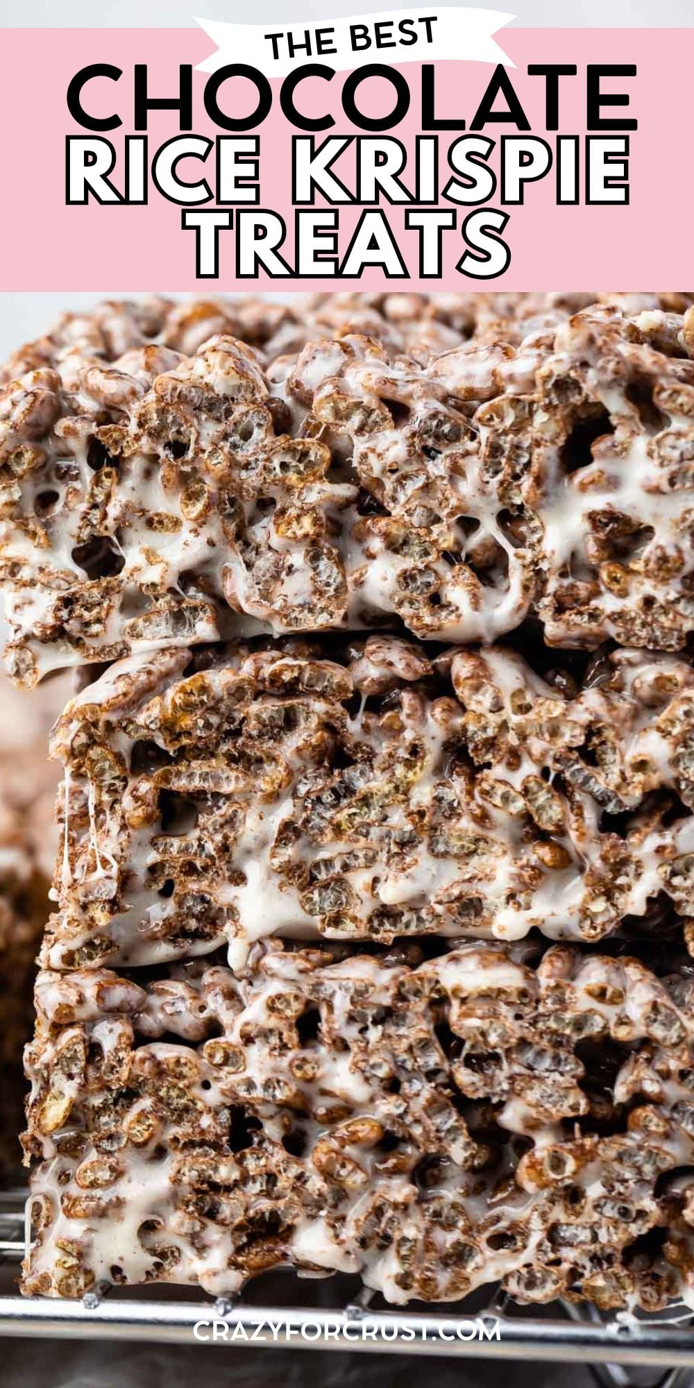 Close-up of three thick, gooey chocolate Rice Krispie treats stacked on top of each other, with melted marshmallow throughout. Text above reads, The Best Chocolate Rice Krispie Treats—perfect for any chocolate lover!.