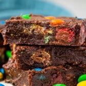 stacked brownies with colorful m&ms baked in.