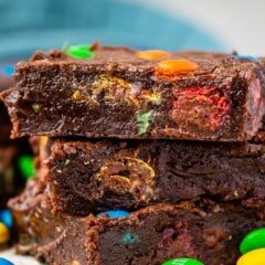 stacked brownies with colorful m&ms baked in.