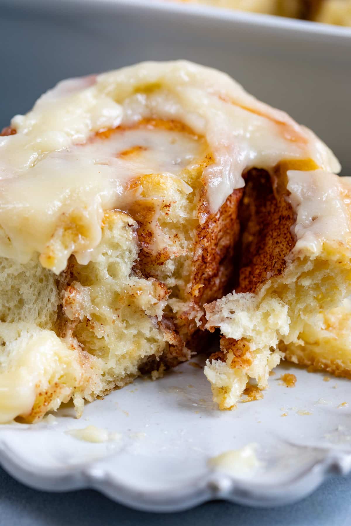 cinnamon rolls with icing on top.