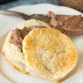 biscuits with chocolate homey butter spread on the biscuits.