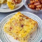 one slice of egg casserole with bacon baked in.