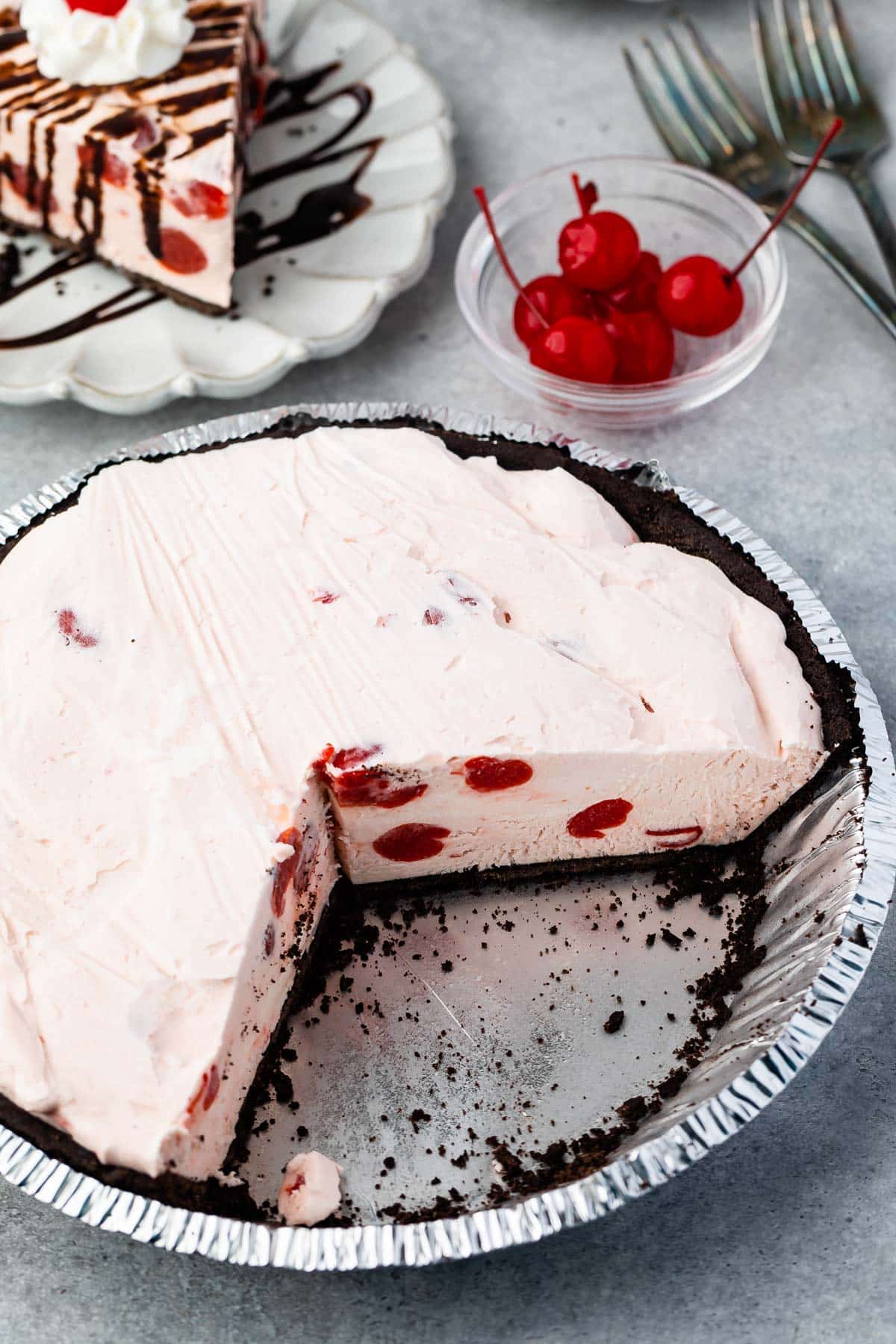 pink ice cream pie in a tin pie pan.