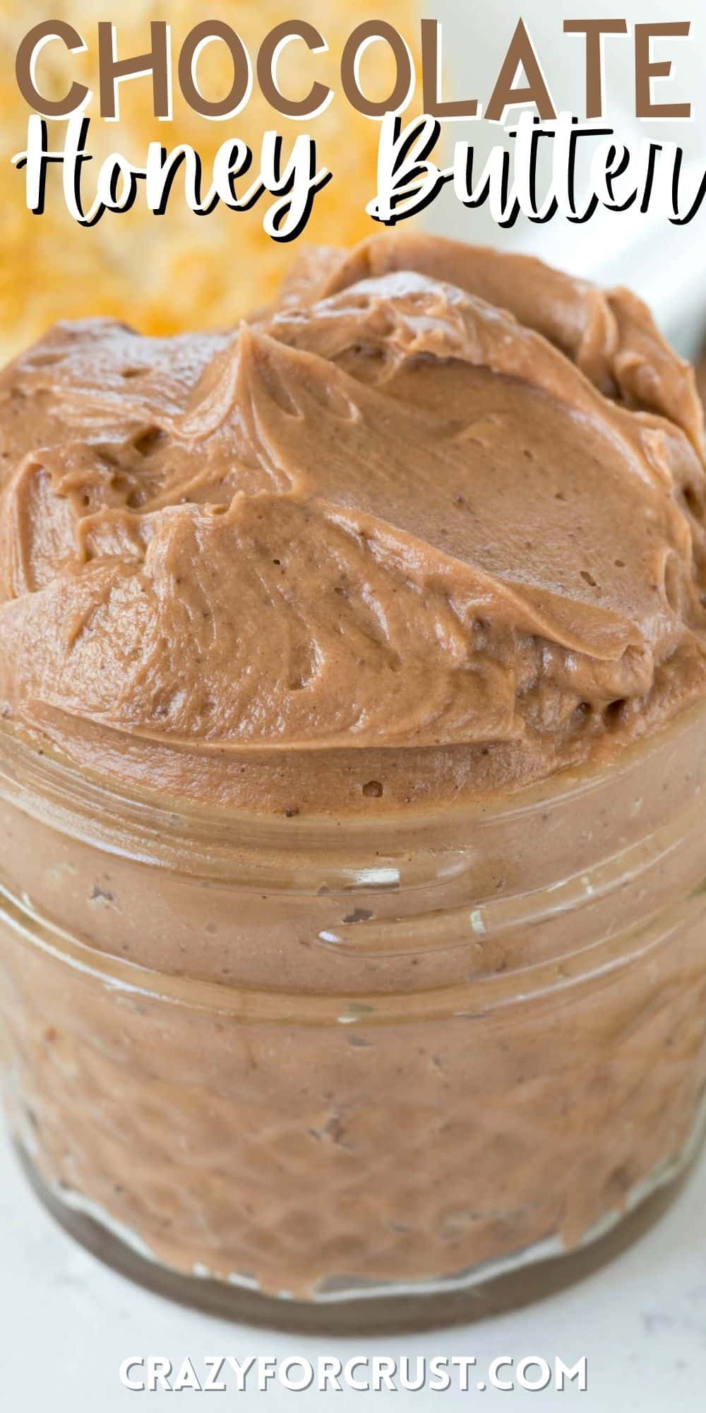 chocolate honey butter in a clear small jar with words on the image.
