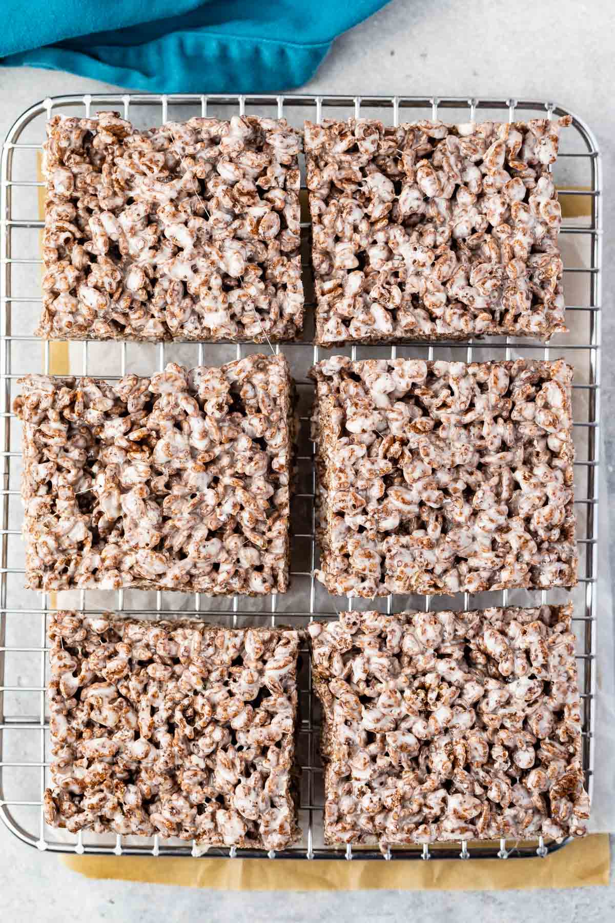 stacked Rice Krispie Treats made with cocoa pebbles.