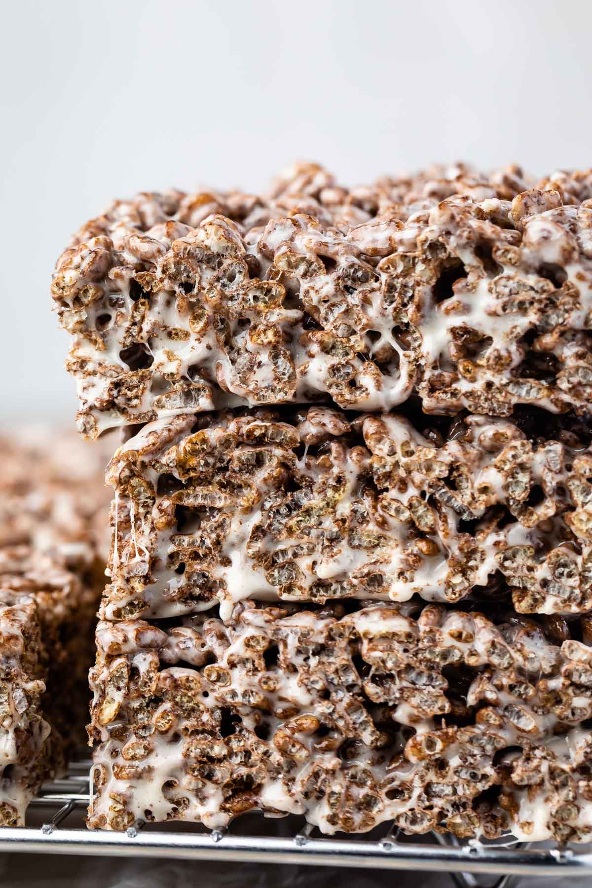 stacked Rice Krispie Treats made with cocoa pebbles.