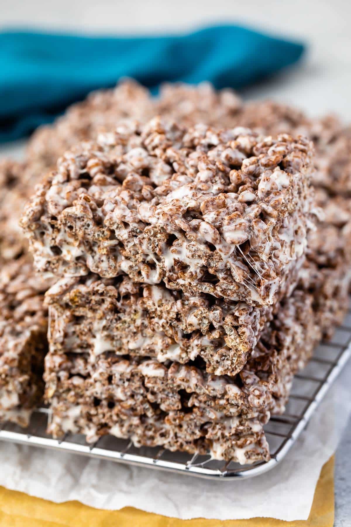 stacked Rice Krispie Treats made with cocoa pebbles.