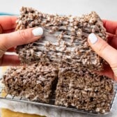 stacked Rice Krispie Treats made with cocoa pebbles.