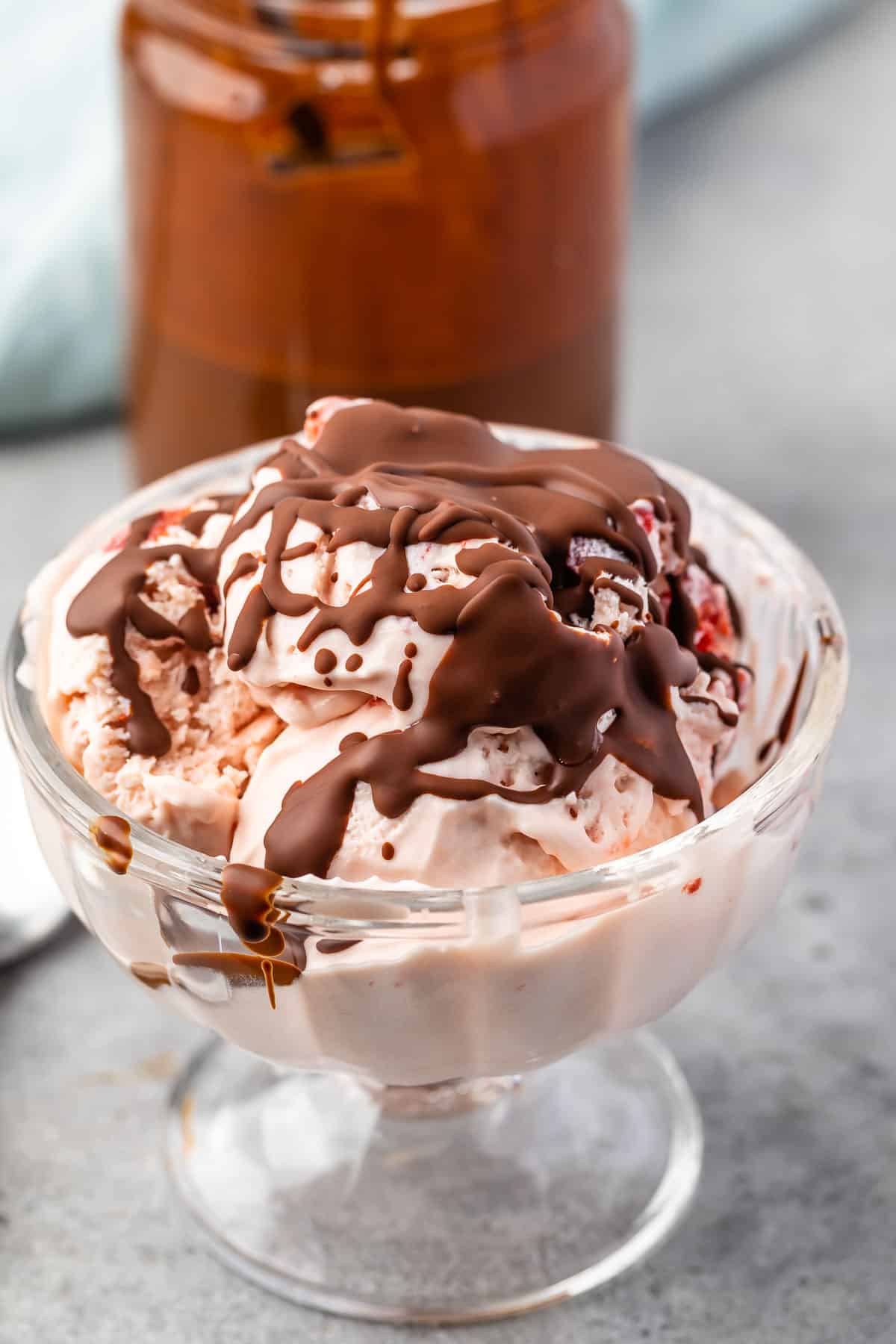 ice cream in a clear jar covered in the magic shell.