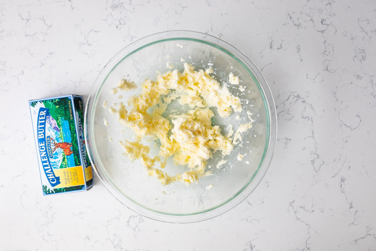 creamed butter and sugar in large bowl with butter box.