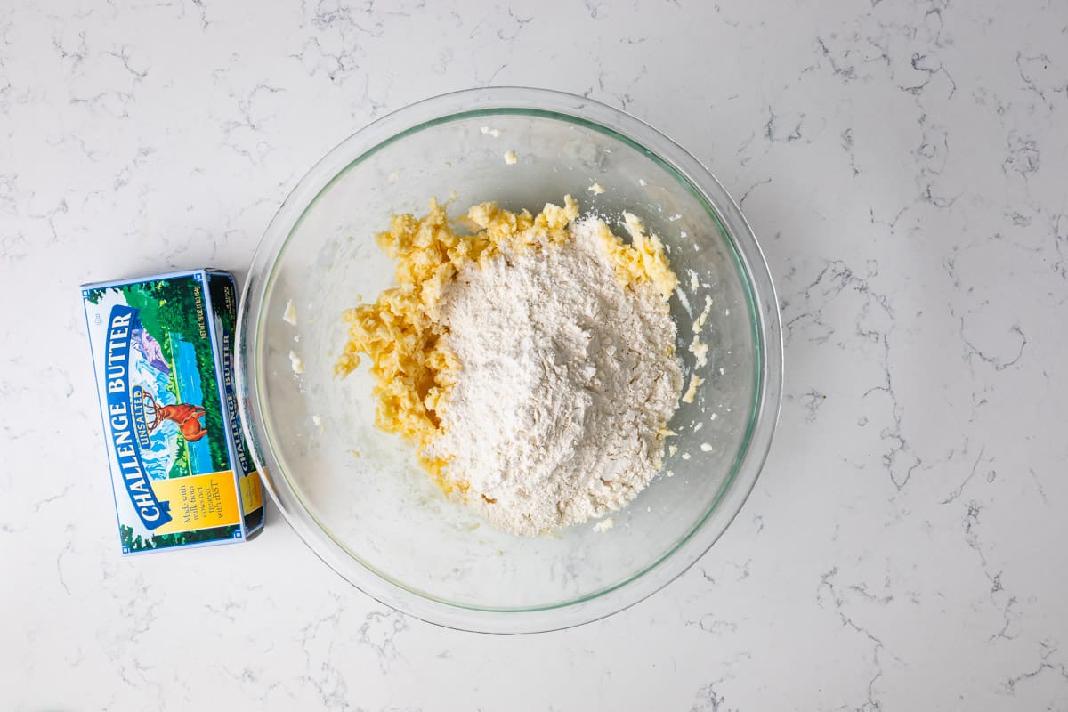 dough with flour in pan with butter box.