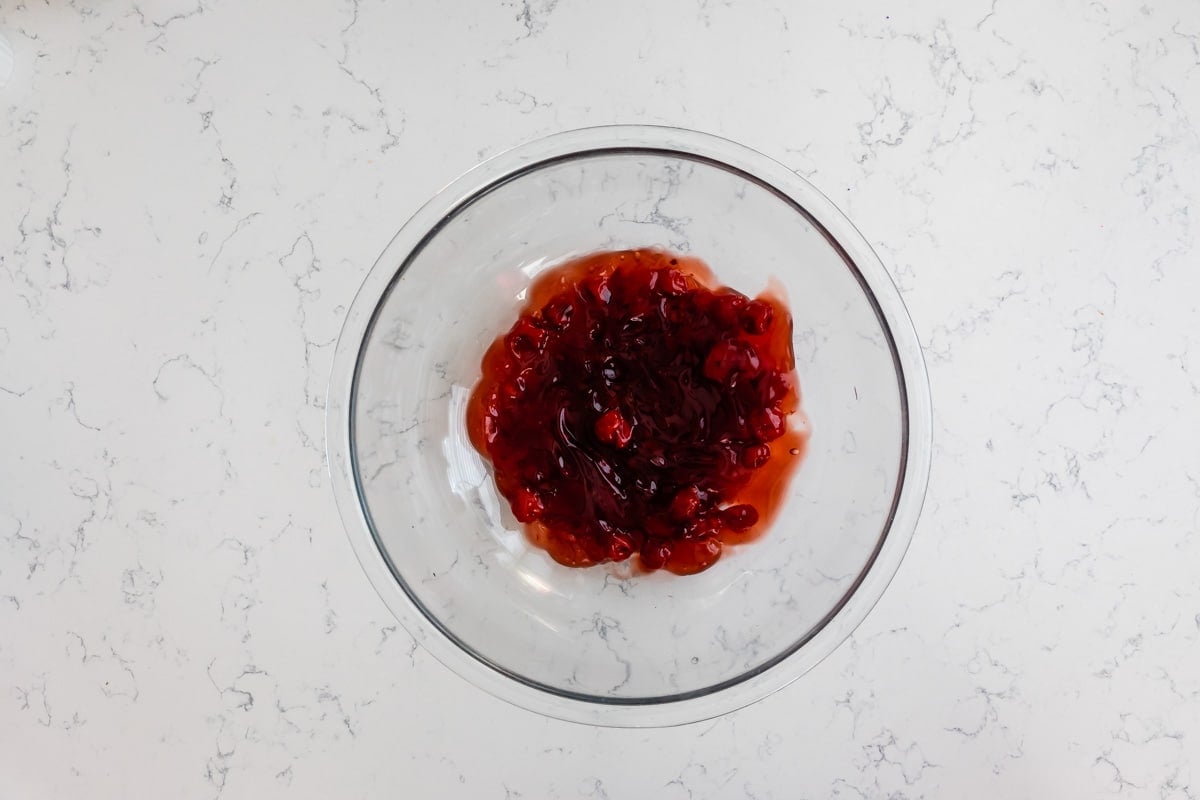 process shot of cherry ice cream pie.