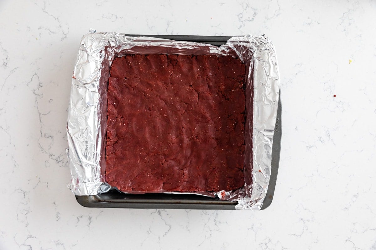 process shot of red velvet gooey bars.