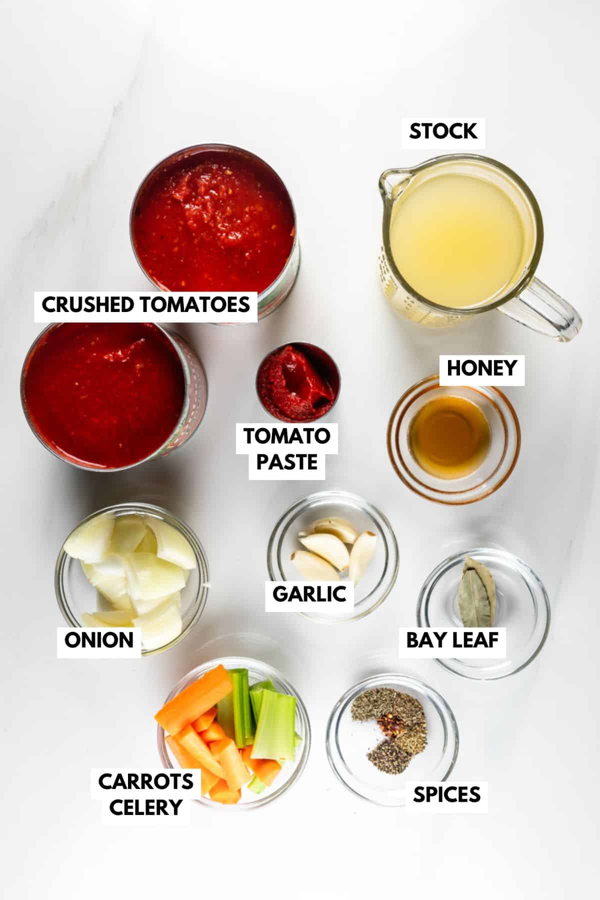 A delectable spread of dishes features the rich aroma of Crockpot Spaghetti Sauce, enveloping each bowl with its irresistible flavor.