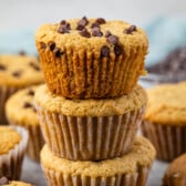 stacked muffins with chocolate chips sprinkled on top.
