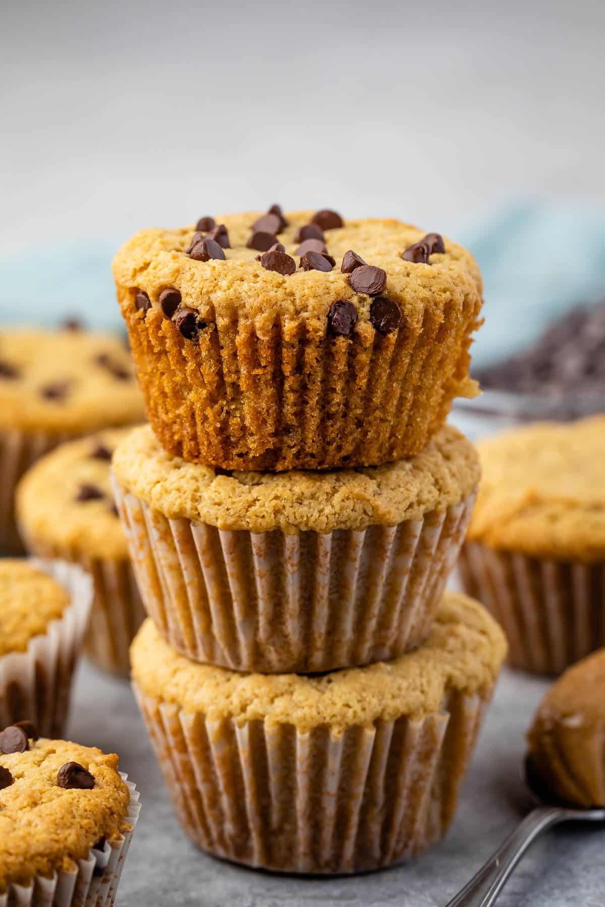 stacked muffins with chocolate chips sprinkled on top.