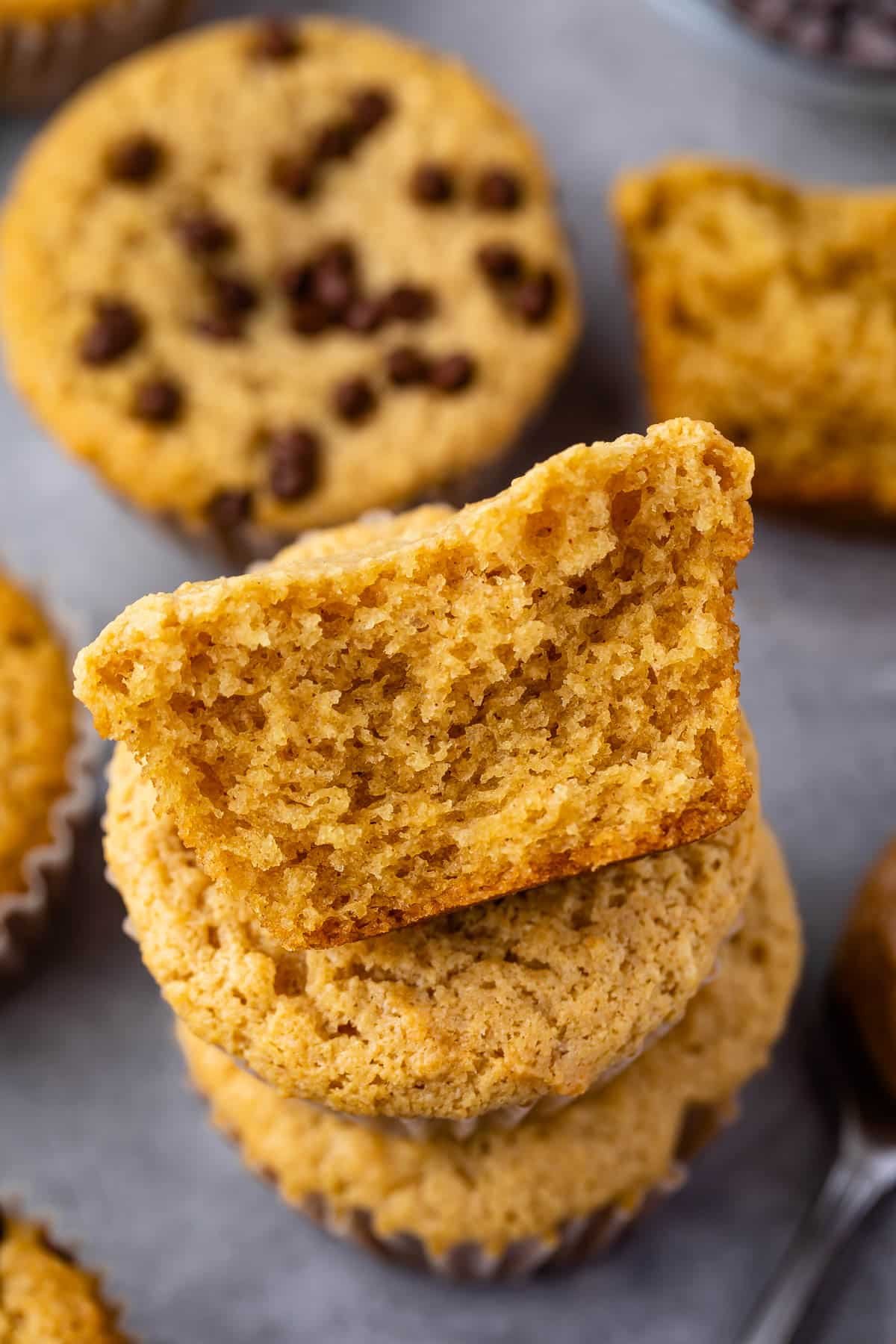 stacked muffins with chocolate chips sprinkled on top.