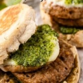 sausage cheese and pesto in a bun with words on the image.