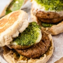 sausage cheese and pesto in a bun.