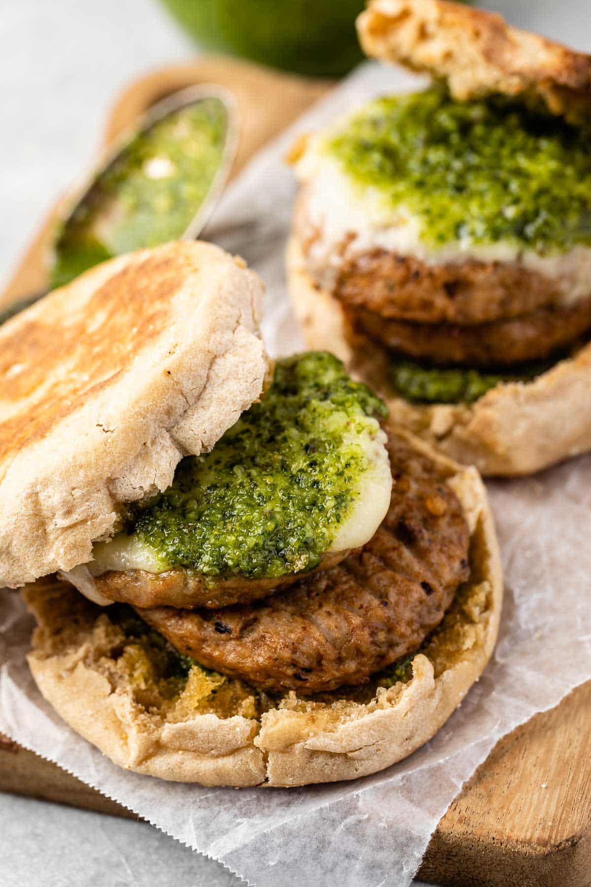 sausage cheese and pesto in a bun.