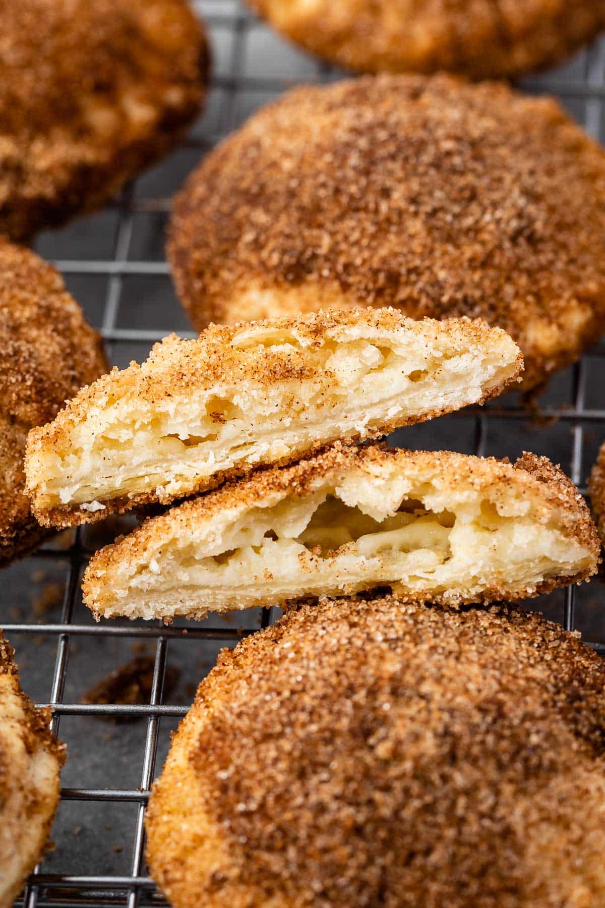 churro cookies laid out on a drying rack.