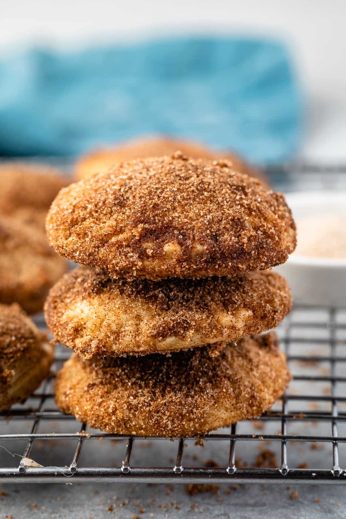 churro cookies laid out on a drying rack.