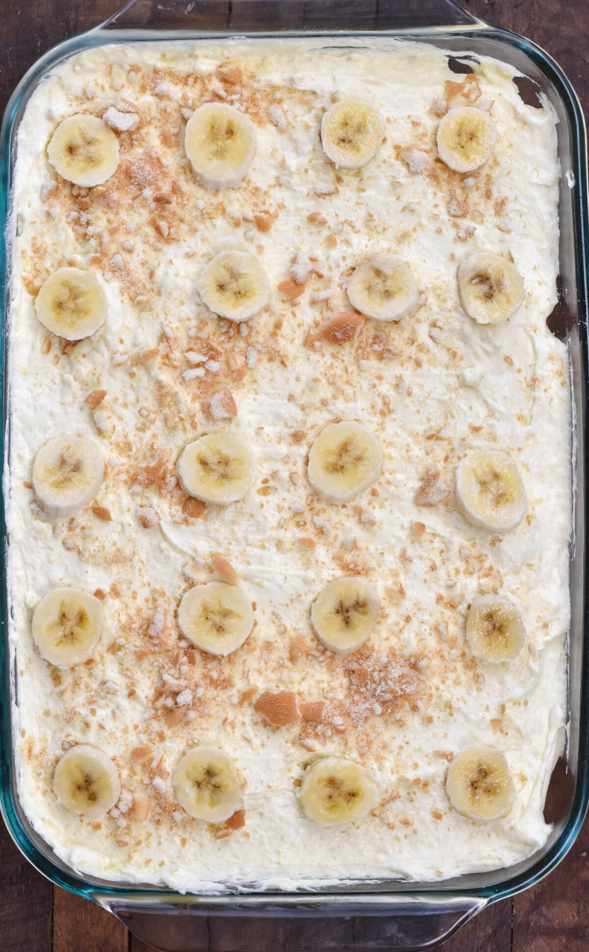 pudding cake with slices of bananas on top.