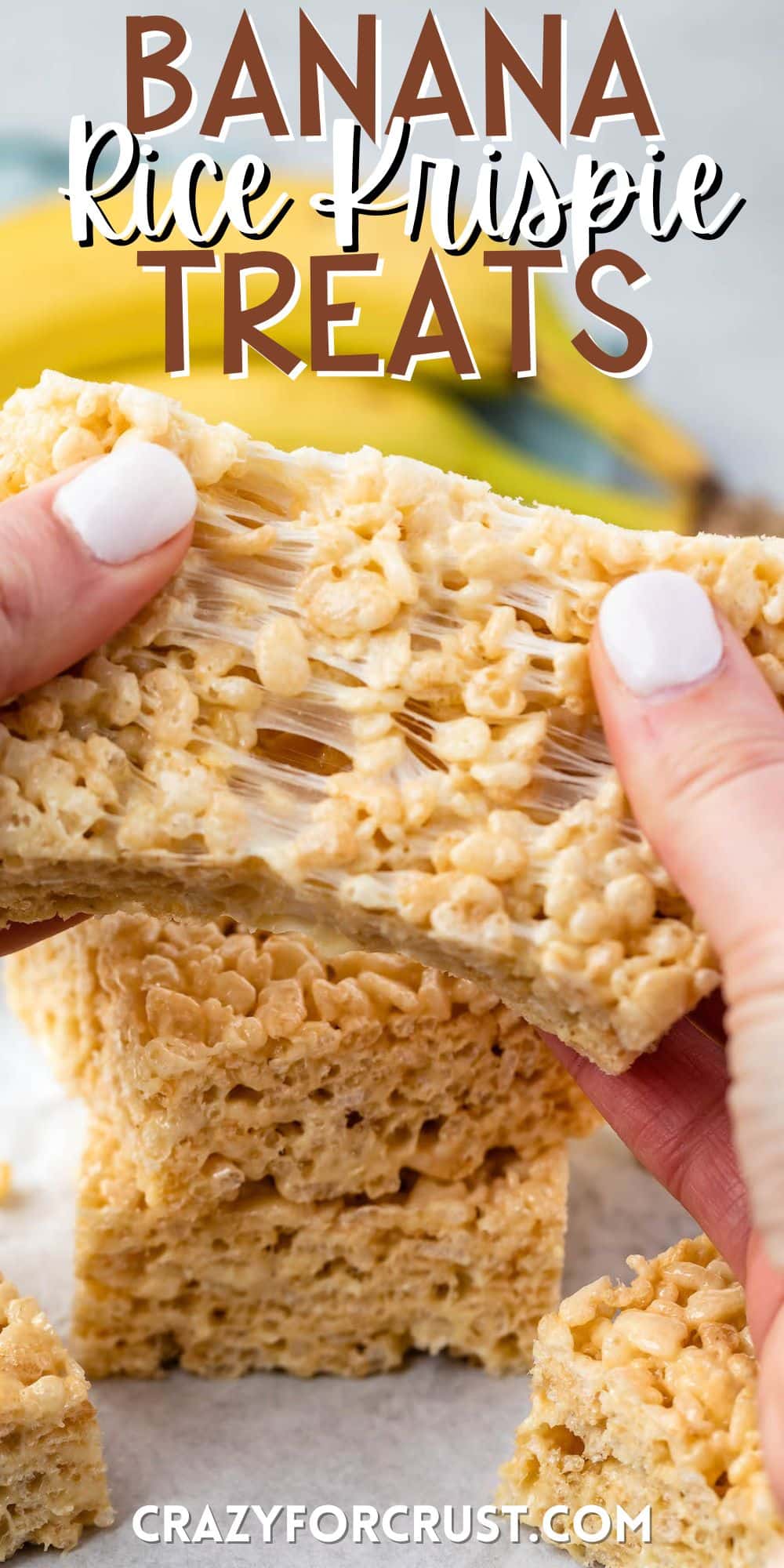 Rice Krispie Treats being torn apart with two hands and with a banana in the background with words on the image.