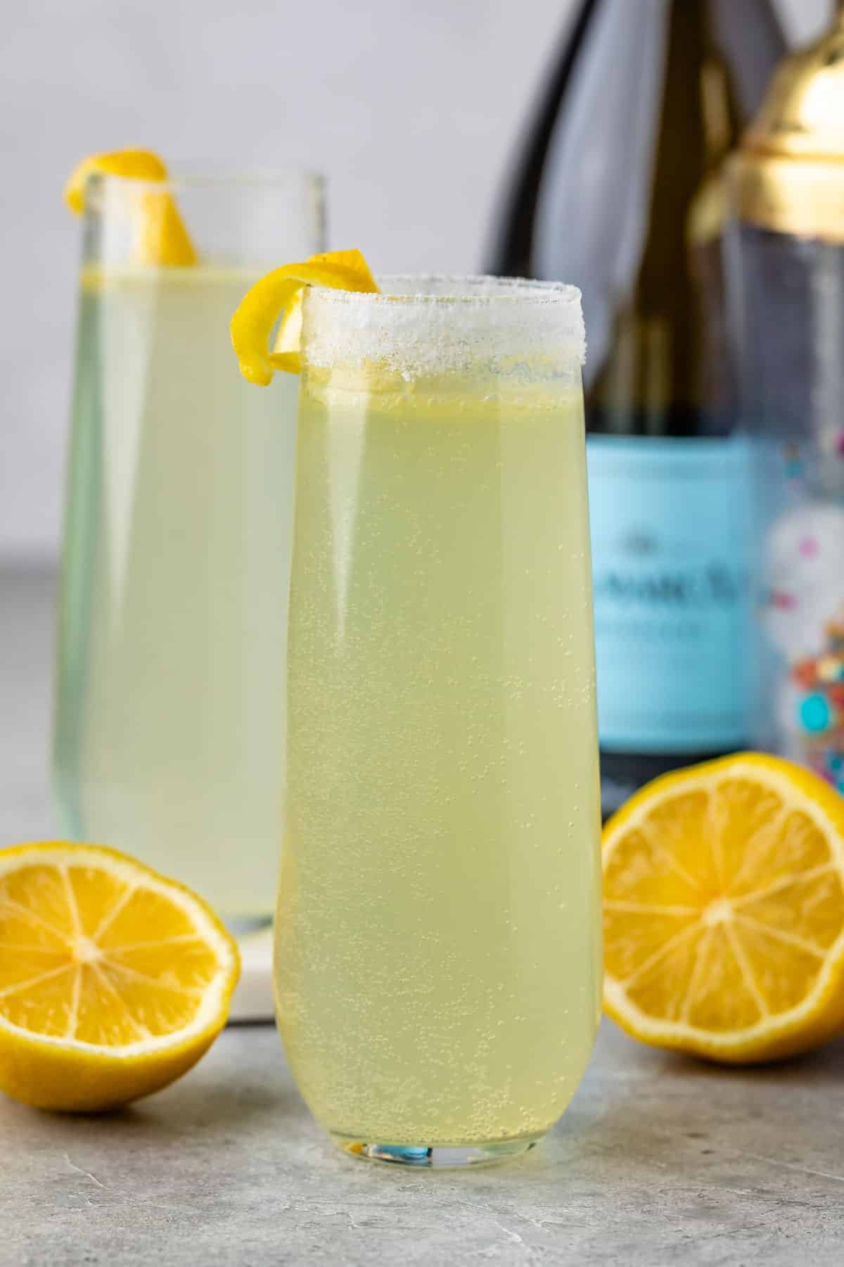 Cocktail with large ice cube and lemon twist Stock Photo