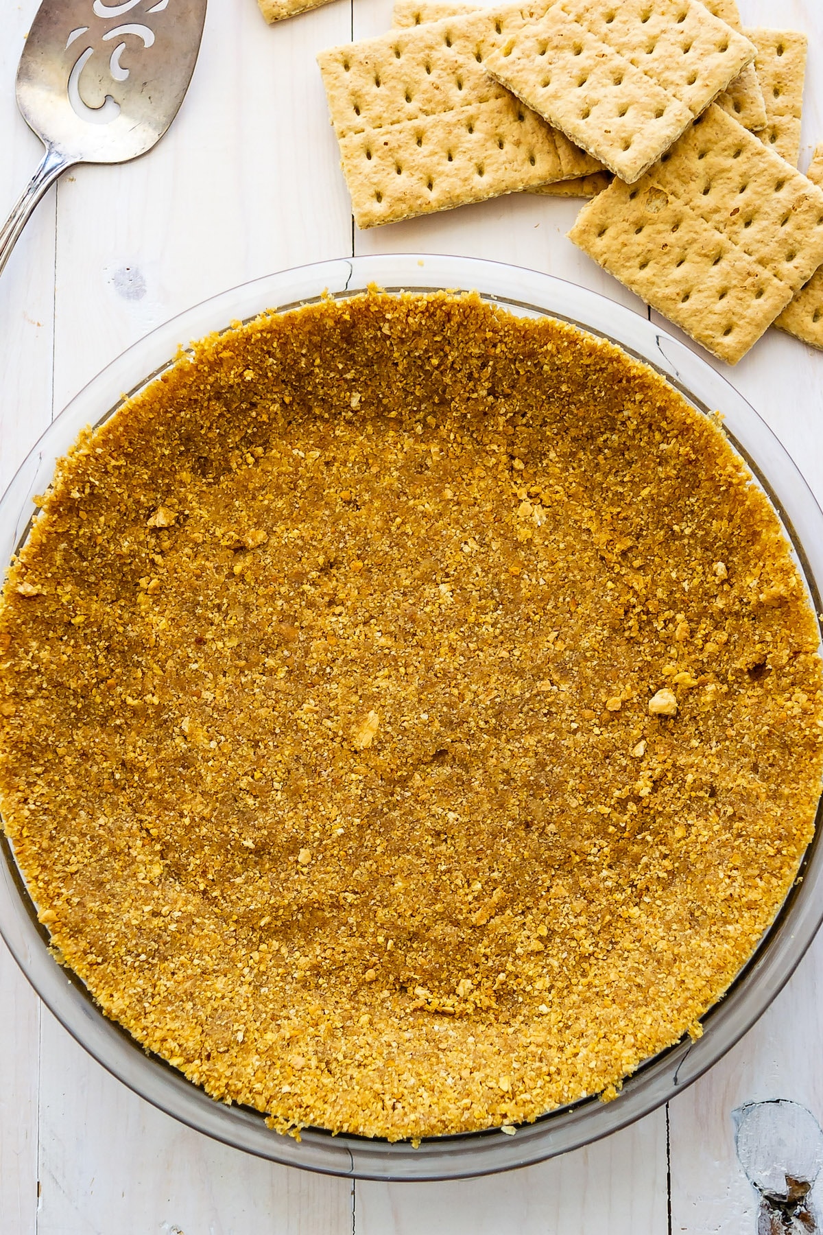 https://www.crazyforcrust.com/wp-content/uploads/2023/04/how-to-make-a-graham-cracker-crust-6.jpg