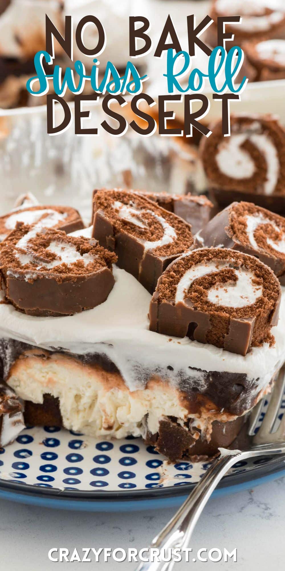 Swiss roll dessert on a plate next to a fork with sliced Swiss rolls on top with words on the image.