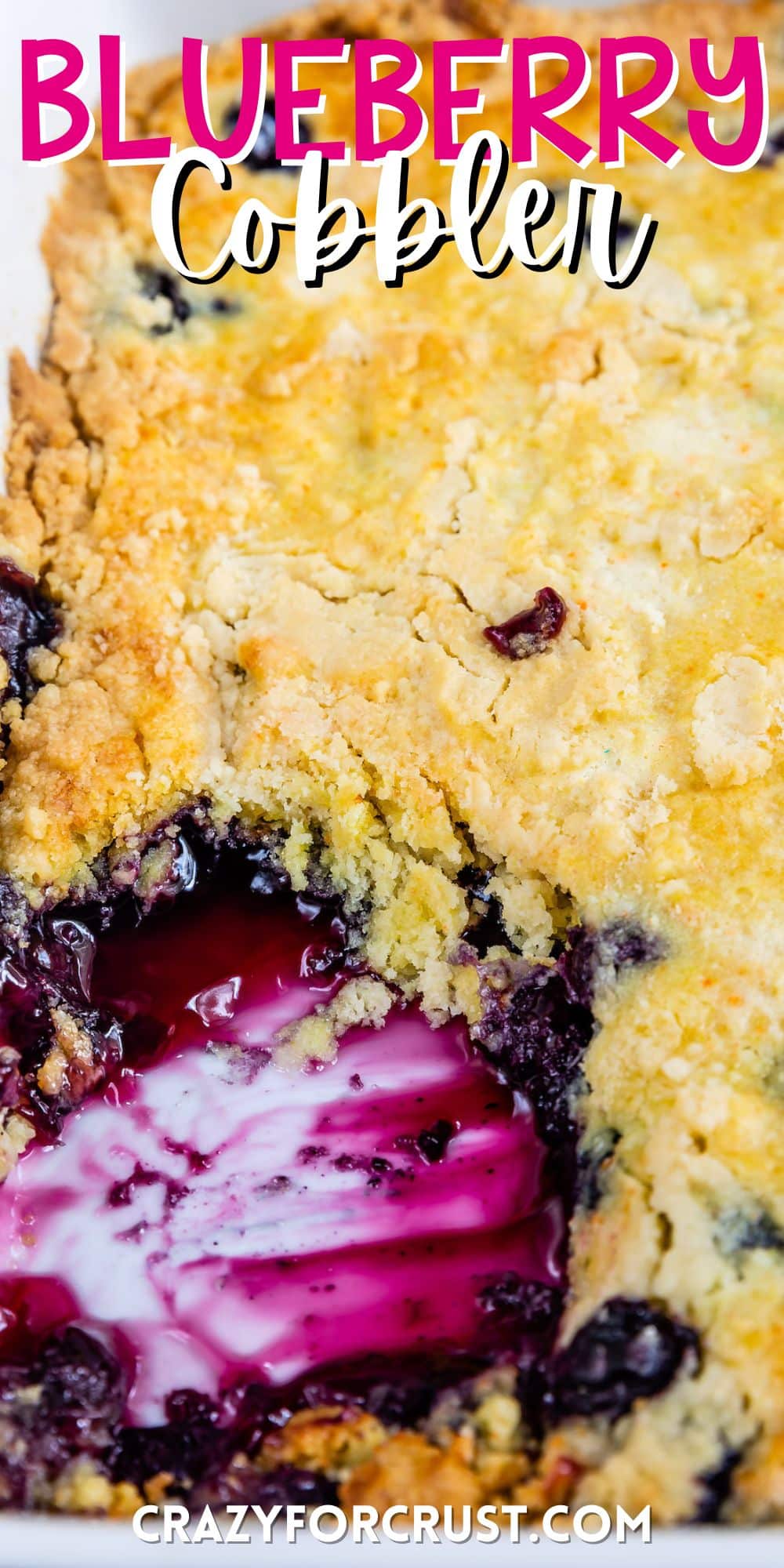 cobbler with a scoop taken out of it in a white glassware with words on the image.