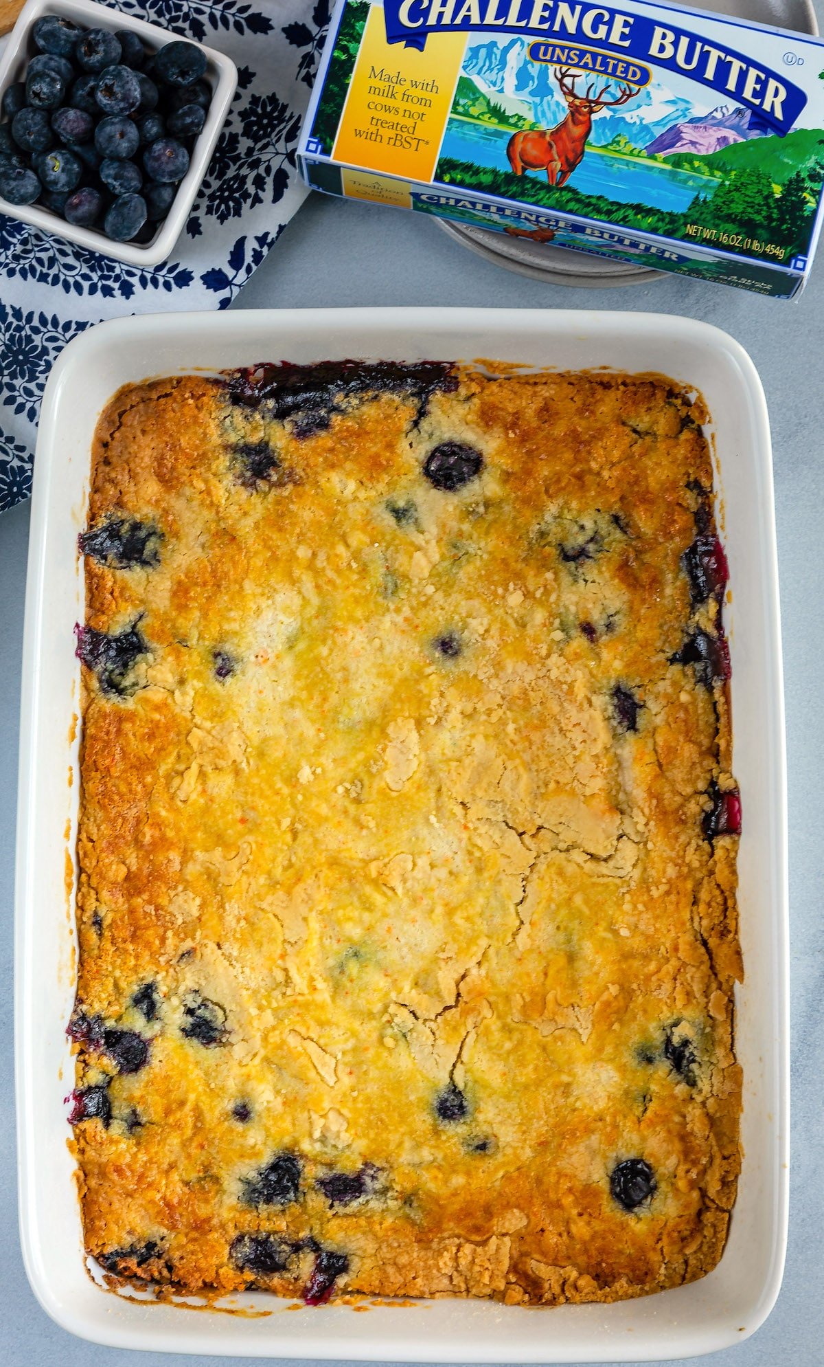 cobbler with a scoop taken out of it in a white glassware.