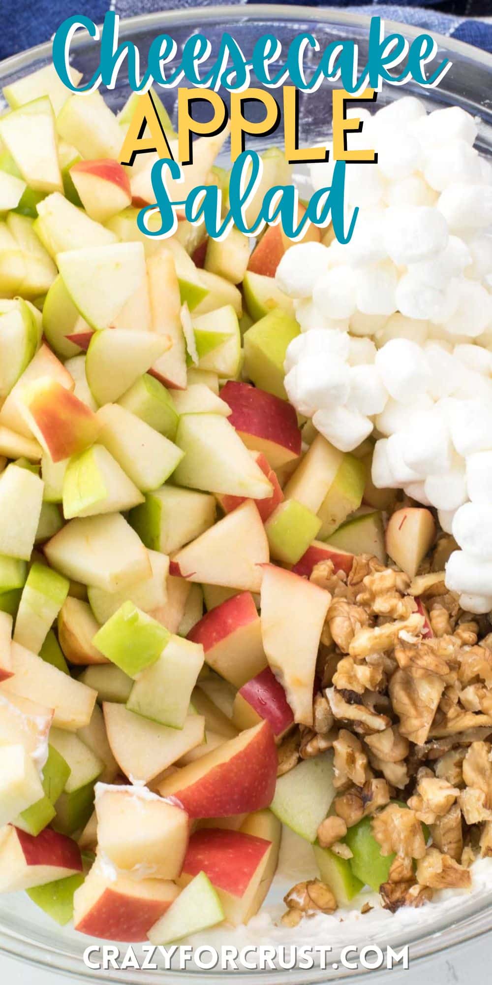 sliced apple and nuts and marshmallows separated in a bowl with words on the image.