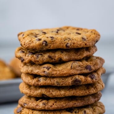 large stack of chocolate chip cookies.