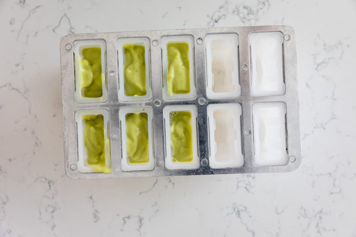 process shot of making avocado popsicles.