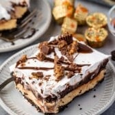 peanut butter and chocolate layered on a grey plate.