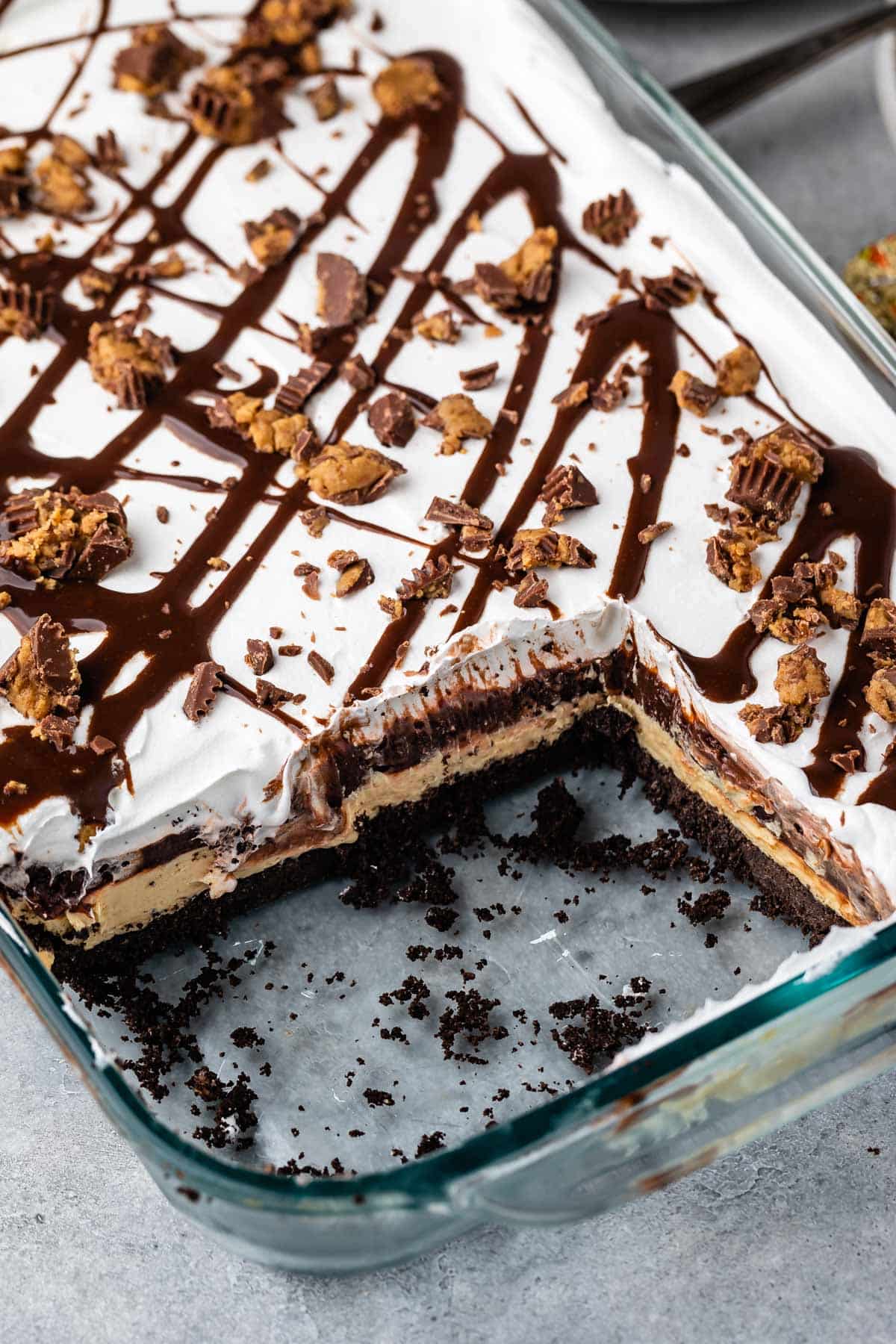 peanut butter and chocolate layered on a grey plate.