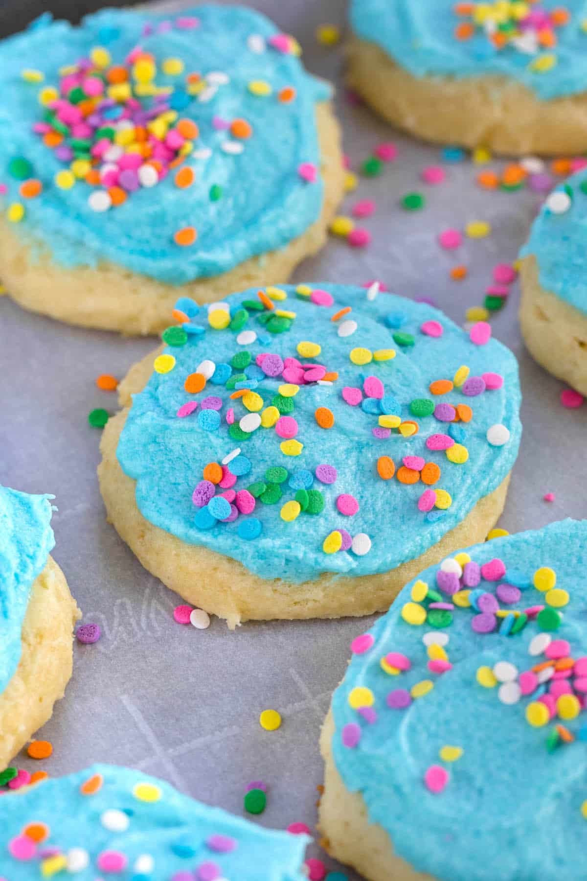 blue frosted cookie with sprinkles