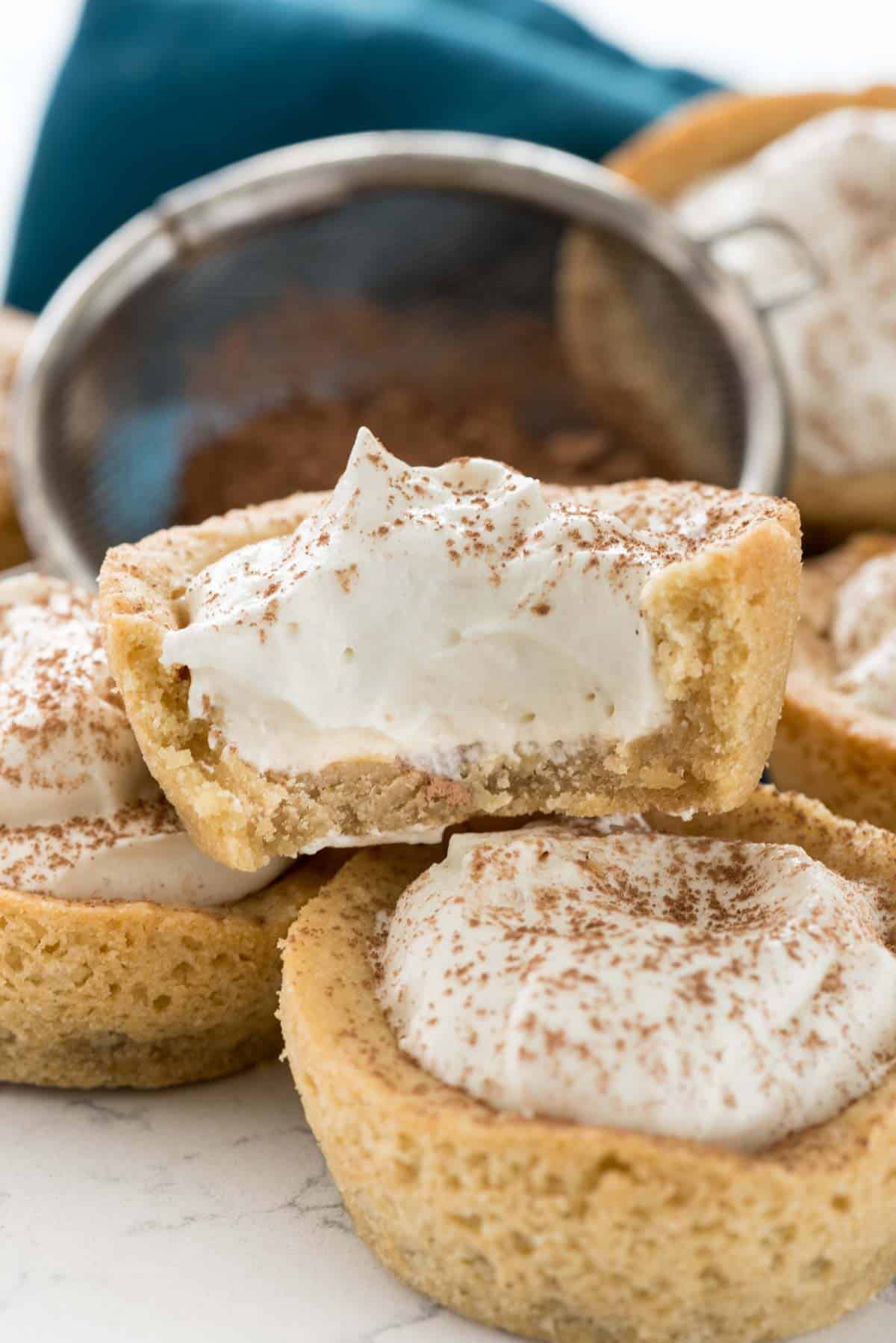 tiramisu in a cookie that shaped like a small cup.