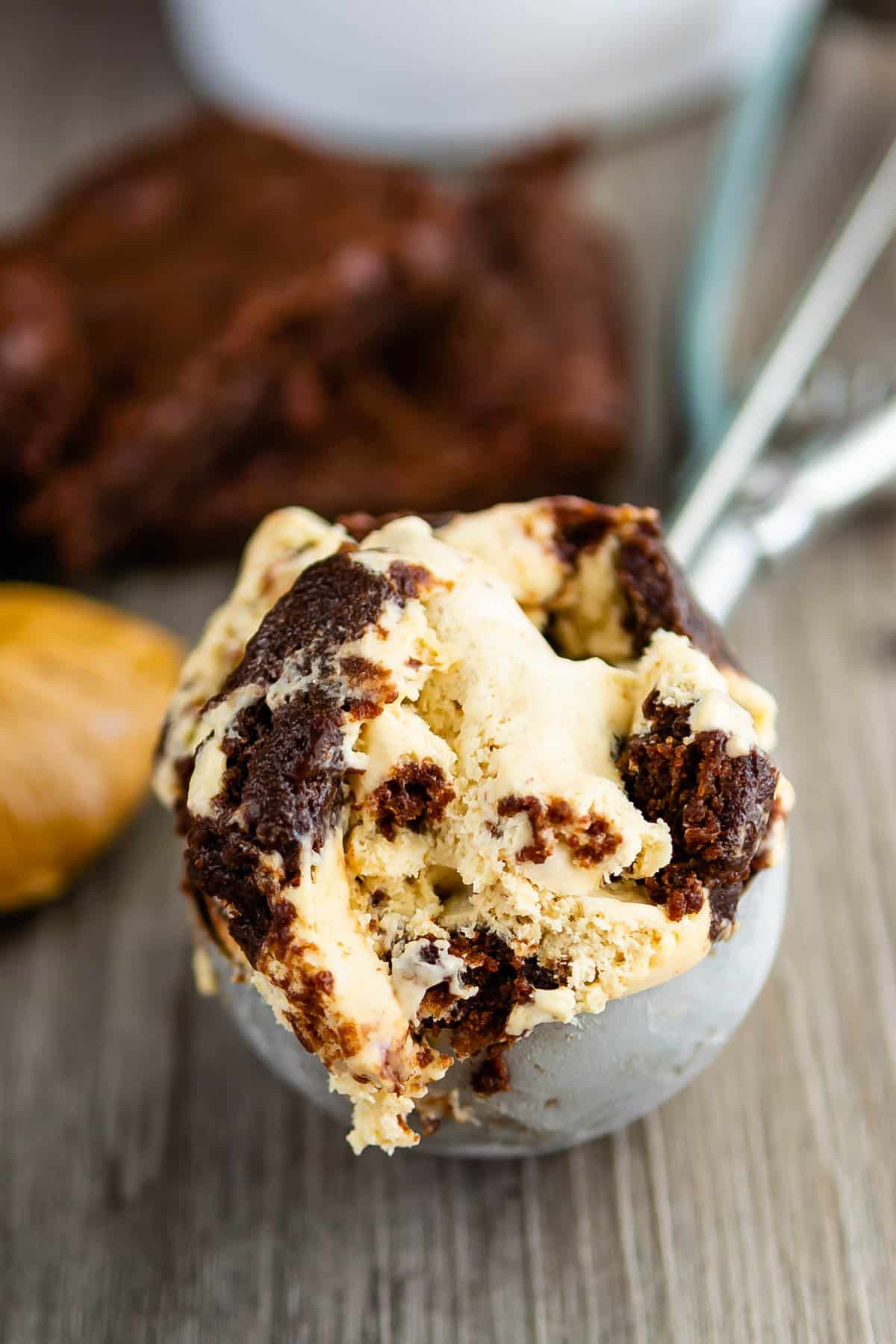 one scoop of ice cream with brownies mixed in.