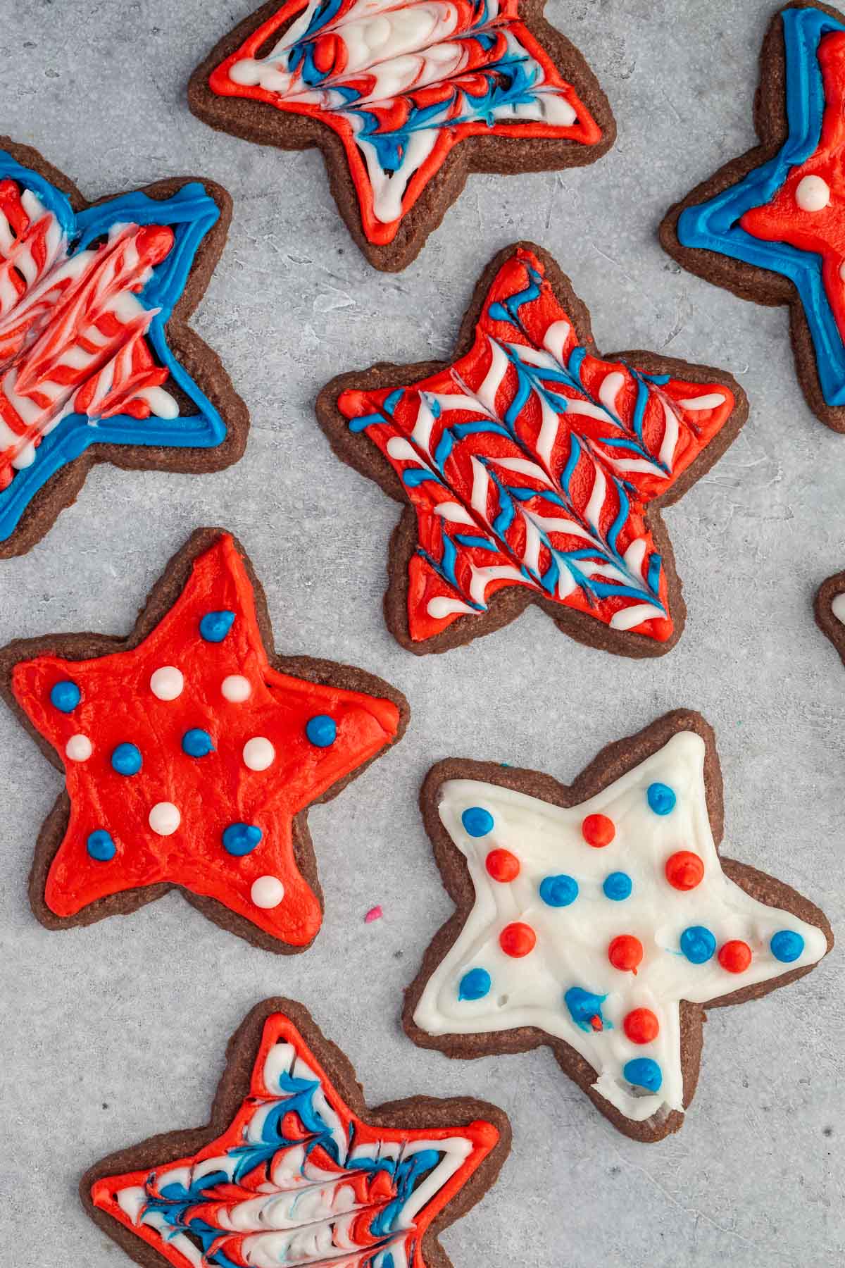 chocolate star sugar cookies with red white and blue frosting