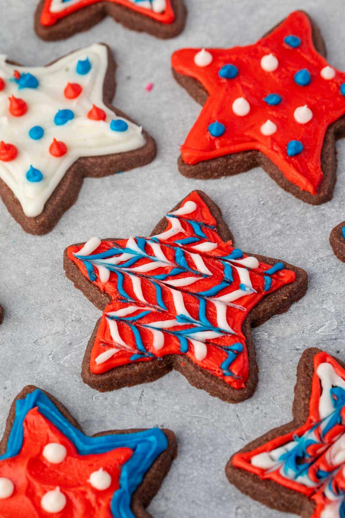 chocolate star sugar cookies with red white and blue frosting