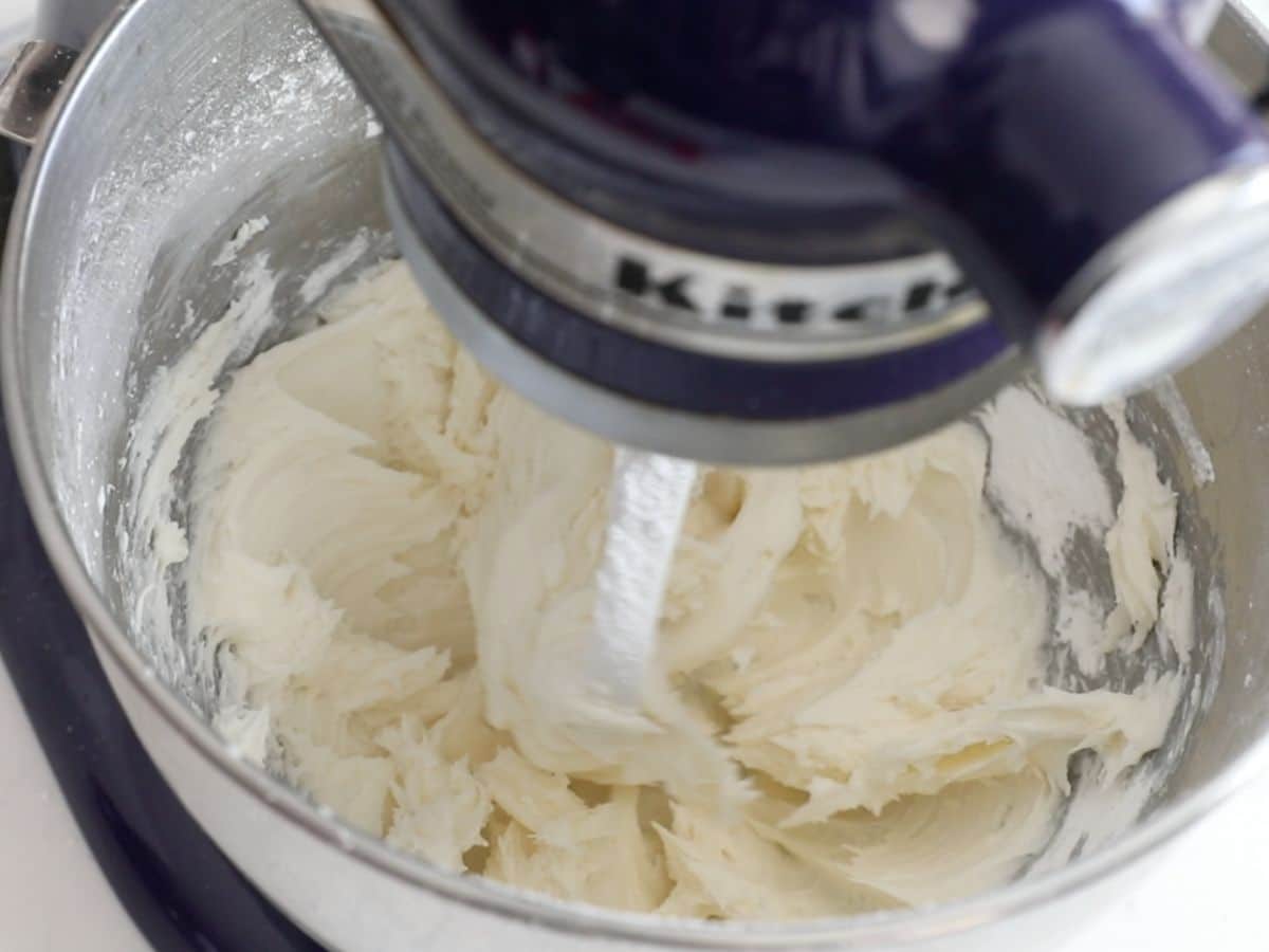 bowl in mixer with frosting