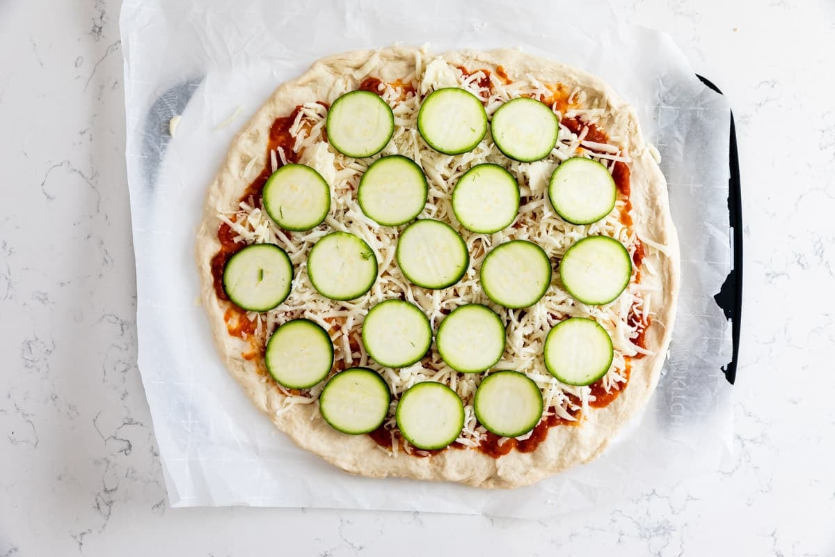 process shot of zucchini pizza.