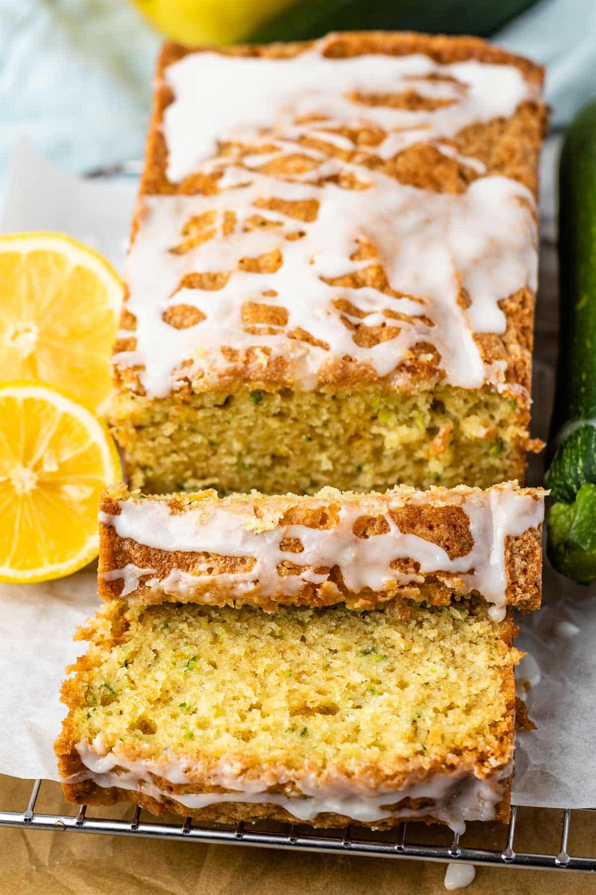 sliced lemon bread coated with icing on top.