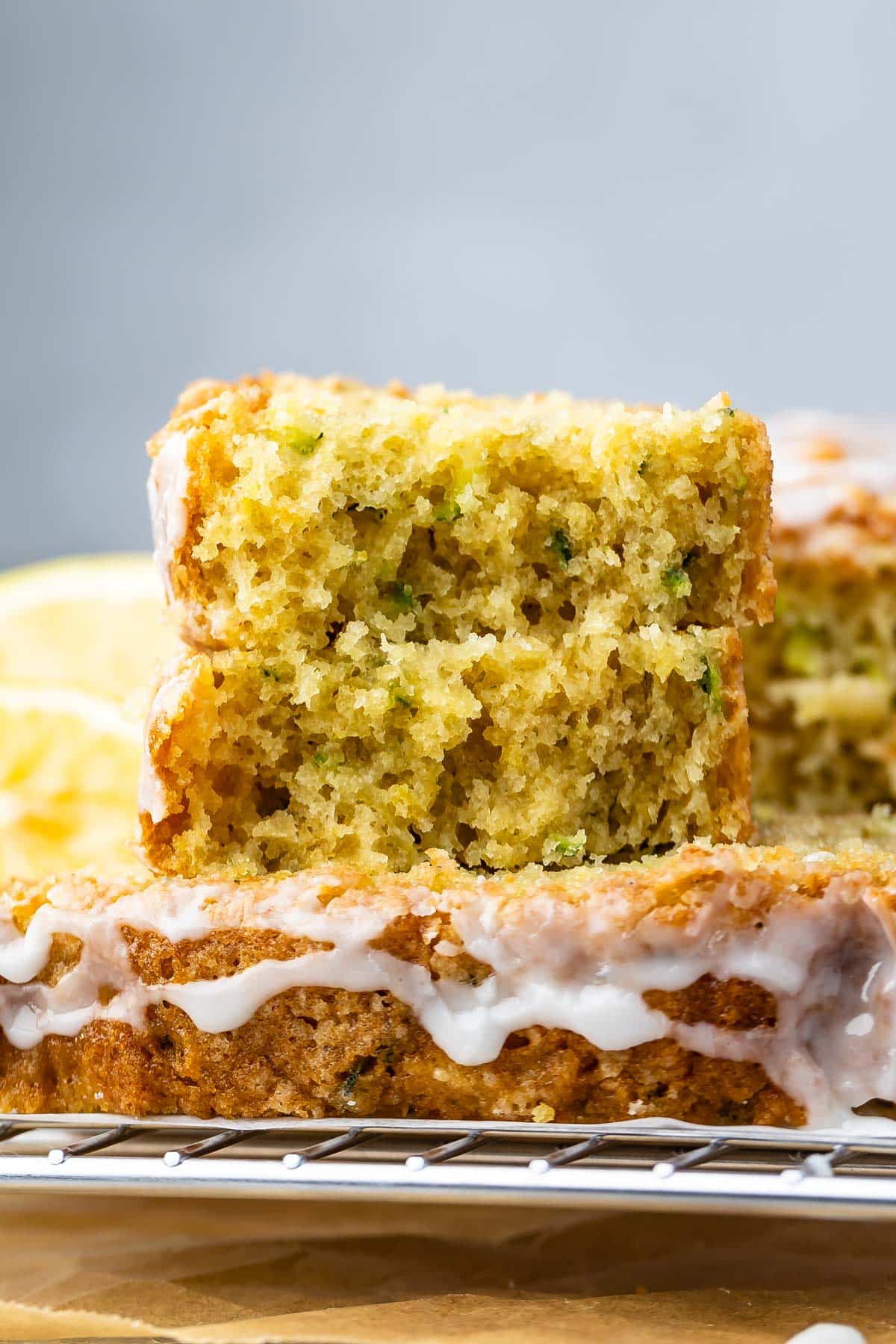 sliced lemon bread coated with icing on top.